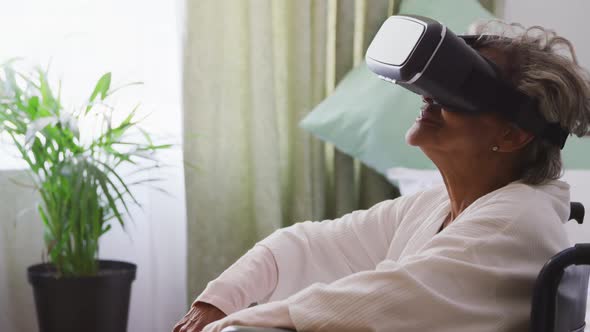 Senior woman in social distancing using VR headset