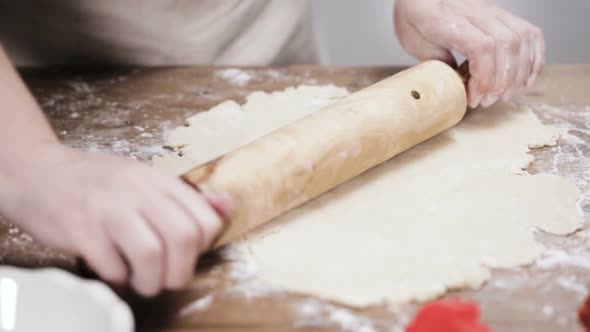 Step by step. Rolling out dough for pie crust.