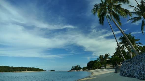 Beautiful tropical beach sea ocean with blue sky and white cloud