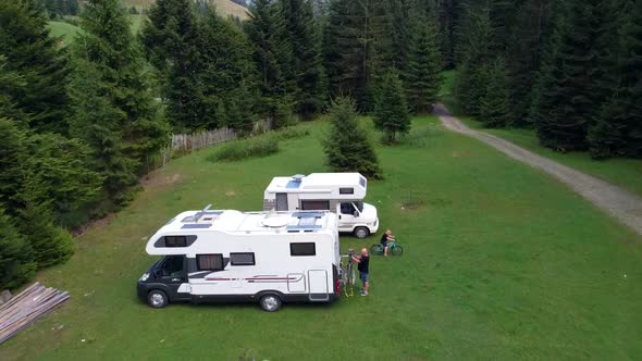 Camper Cars On Vacation In Mountain Area