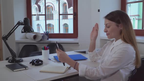 Portrait Happy Office Worker Has Video Call with Partner