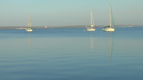 Three Yachts In Marina After Sunrise