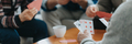 Senior friends sit at a coffee table and play cards - PhotoDune Item for Sale