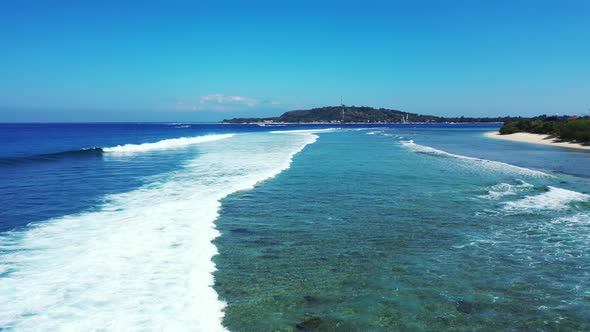 Tropical aerial island view of a white paradise beach and blue ocean background in high resolution 4