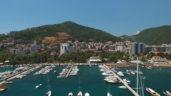 View of the Marinas Against the Background of Modern Buildings on the Coast of Budva