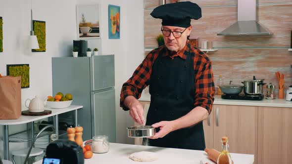 Man Cooking in Front of Camera