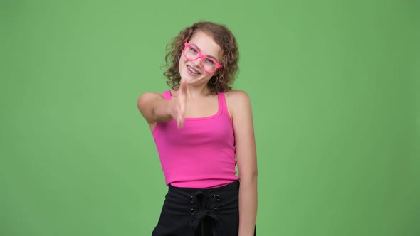 Young Happy Beautiful Nerd Woman Giving Handshake