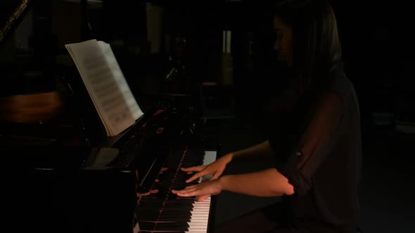 Woman playing a piano