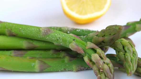 Closeup Of Green Asparagus With Lemon.