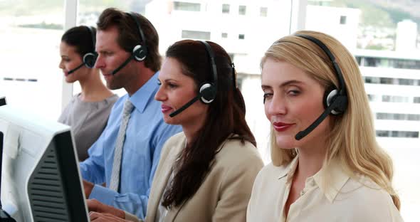 Happy Call Center Employees at Work