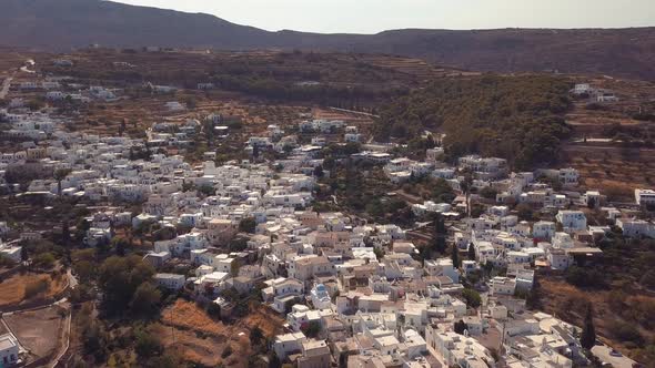 Wide Aerial Drone Shot Revealing the Many Buildings and Houses of the Island Village of Lefkes Greec