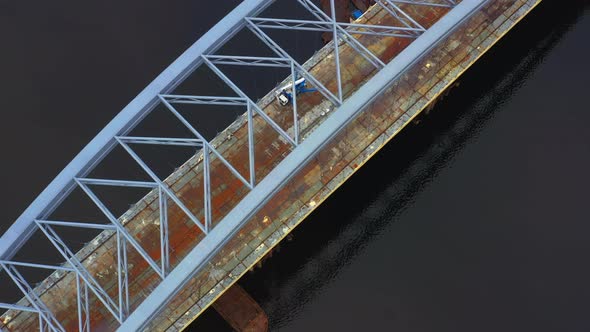 Unfinished Big Bridge Across the River Under It Rusty Barges