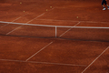male tennis player in corner of tennis court - PhotoDune Item for Sale