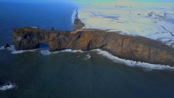 High Level View of Dyrholaey Arch in Iceland