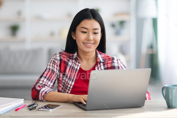 an Female Student Study With Laptop At Home, Millennial Asian Woman Typing On Computer And Smiling, Enjoying Online Education, Free Space