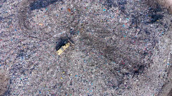 Industrial Bulldozer Working on a Landfill