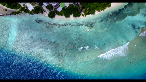 Aerial view nature of relaxing lagoon beach voyage by aqua blue sea and white sandy background of a 