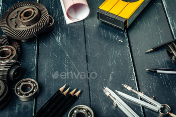 Machine engineer tools set on dark wooden background