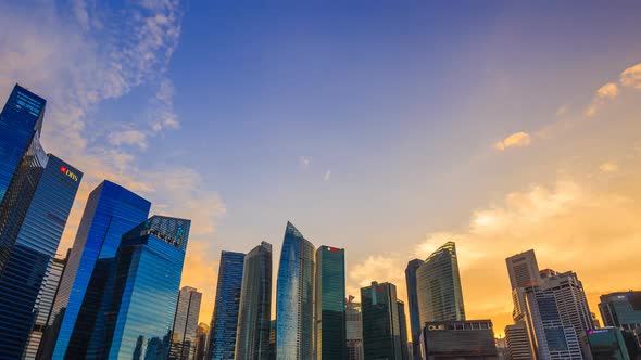 4k Day to night Time-lapse of central business district building of Singapore city