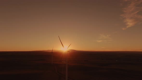 Aerial shots of a wind farm near Calhan in Colorado around sunset