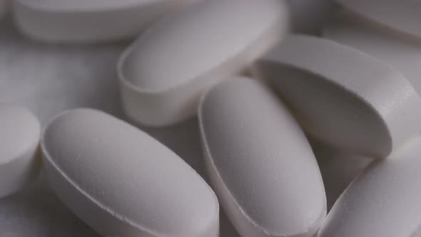 Rotating stock footage shot of vitamins and pills