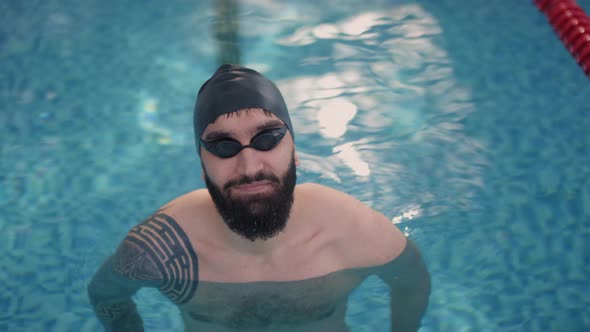 Portrait of Male Swimmer in Pool