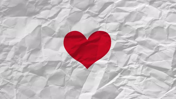 Pulsating red heart on paper background