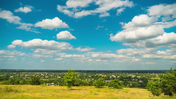 Landscape Fields and Moving Clouds in Blue Sky. Timelapse. Amazing Rural Valley. Ukraine