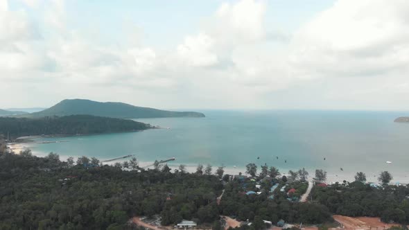 Tropical holidays paradise. Forest, sand and calm turquoise waters. Koh Rong Samloem, Cambodia 