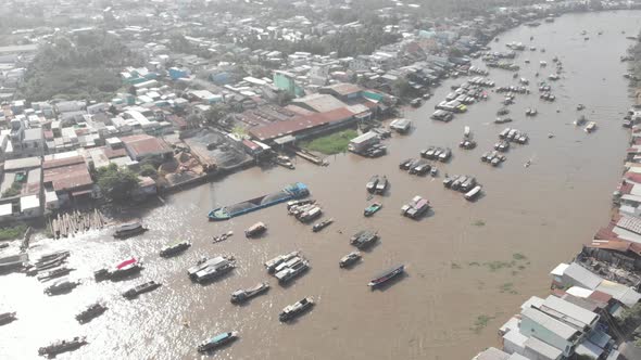 Aerial: rotating panorama over Cai Rang floating market Can Tho Vietnam