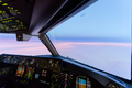 Beautiful twilight sunset sky at high altitude from airplane cockpit view. Modern aviation concept. - PhotoDune Item for Sale