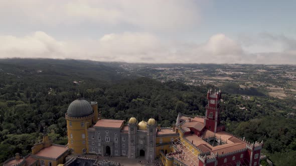 The Pena Palace, colourful Romanticist castle in Sintra, Portugal. Tilt down shot