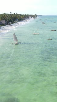 Boat Boats in the Ocean Near the Coast of Zanzibar Tanzania Slow Motion Vertical Video