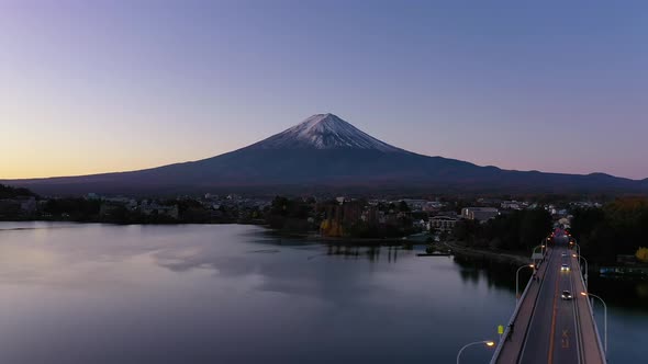 Aerial view 4k video by drone of Mount Fuji and bridge at Kawaguchi lake