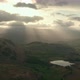 Sun shining above hills in Lake District National Park, Cumbria, UK - VideoHive Item for Sale
