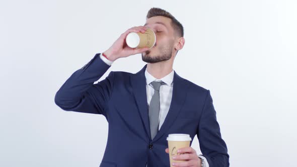 Hyper Businessman Drinking Coffee