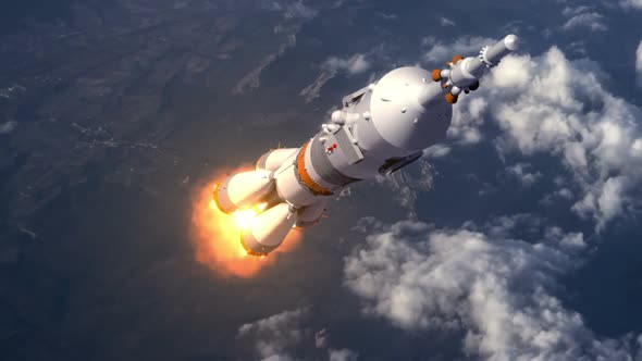 Carrier Rocket Takes Off Over The Clouds alt