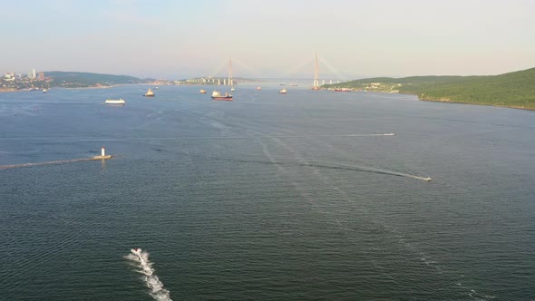 A Picturesque View of the Lighthouse and the Russian Bridge