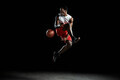 Young male basketball player mid air - PhotoDune Item for Sale