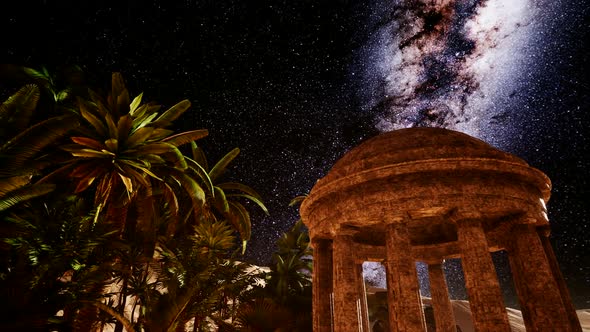 Ancient Roman Time Town in Desert and Milky Way Stars