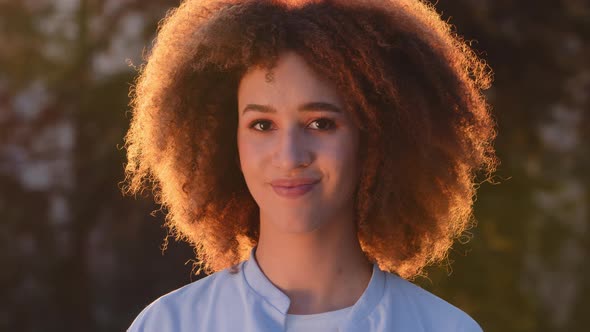 Female Portrait Beautiful Young Ethnic African American Girl Mixed Race Woman with Curly Hair Afro