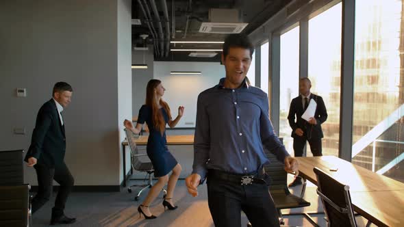 Businesspeople Start Dancing in Office Like in Musical.