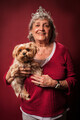Senior woman holding dog and wearing a tiara - PhotoDune Item for Sale
