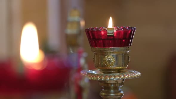 Red Glass Lamp in the Orthodox Church Burning Candle in the Background Orthodox Icons