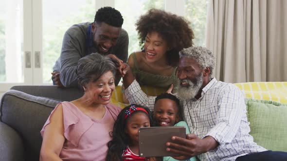 çHappy family spending time together at home