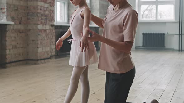 Little Girl Learning Ballet Dance With Trainer