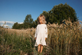 Child in White Dress Standing on the Rye Field - PhotoDune Item for Sale