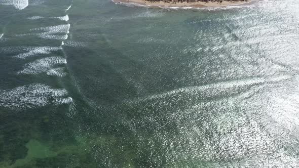 AERIAL Dangerous Square Waves Rolling In Of A Summer Coastline