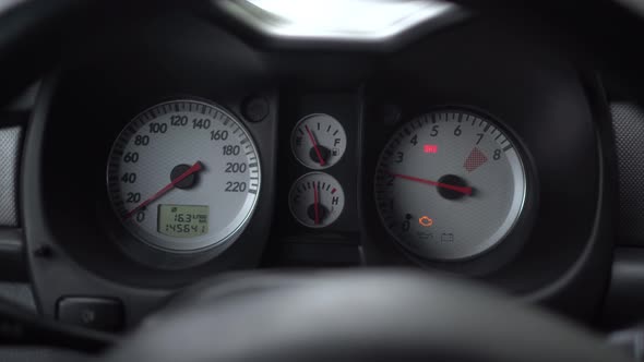 Car Dashboard with Indicators and Gauges