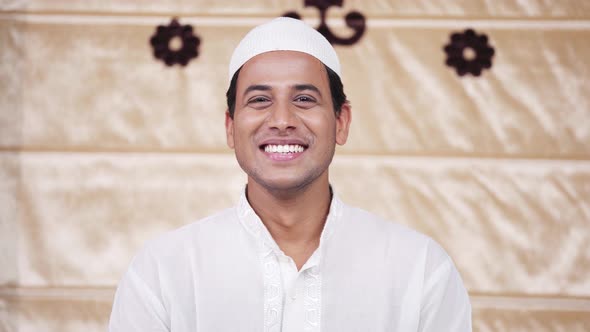 Muslim man smiling